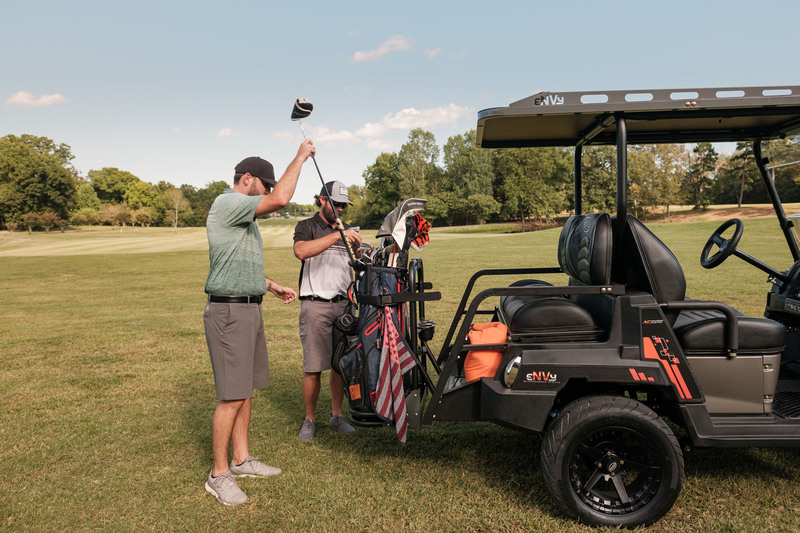 Men getting golf equipment out of envy